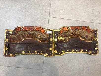 Two decorative elements in carved and partially...