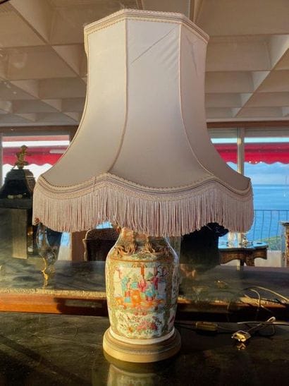 Canton porcelain vase decorated with characters.

China,...