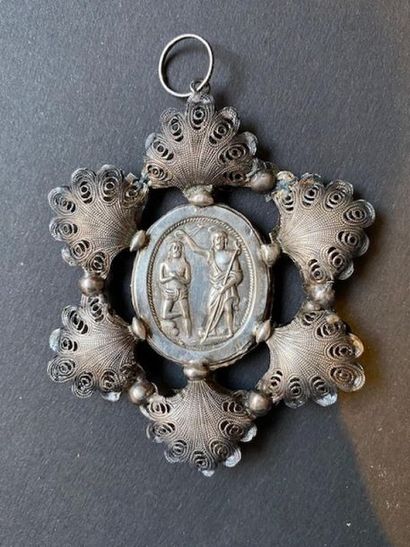 Silver filigree medallion from the 17th century...