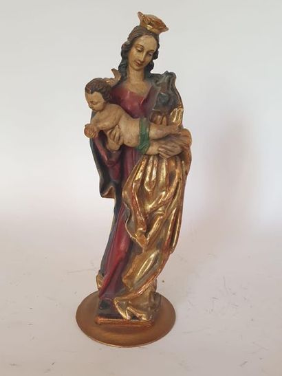 Vierge à l’enfant en bois sculpté, doré et...