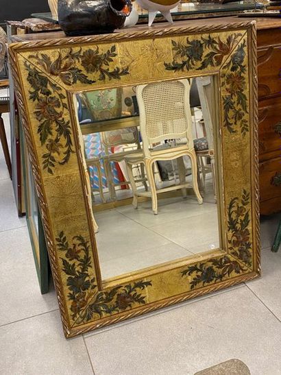 Miroir rectangulaire à cadre en verre églomisé

Années...
