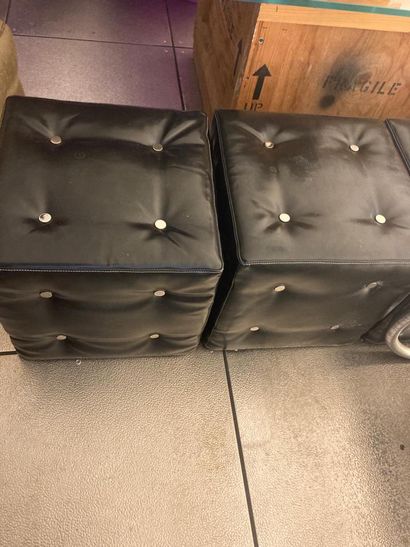 Suite of four black cubic poufs