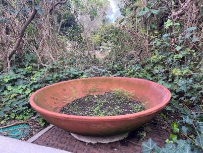 Large terracotta basin marked 