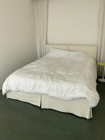 Two single beds and their bedding. With its...