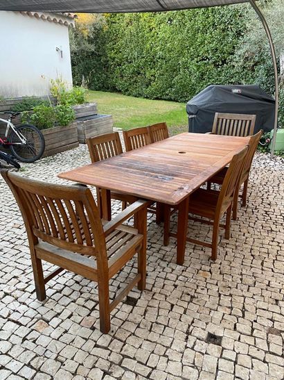 Set including a large table, six chairs and...