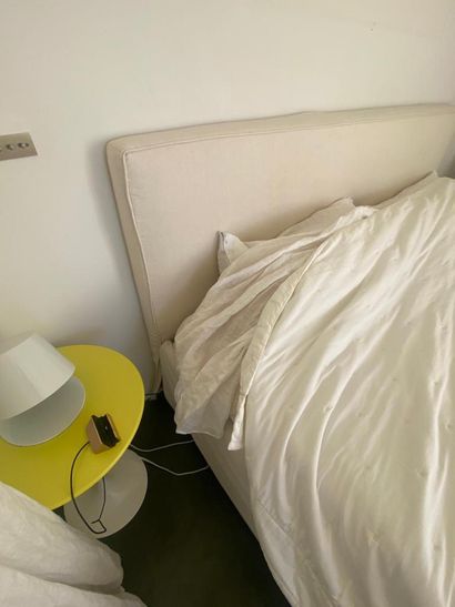 Two single beds and their bedding. With its...