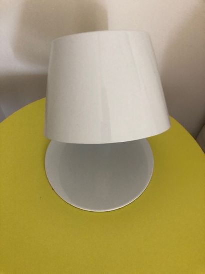 Set of three white lacquered metal table...