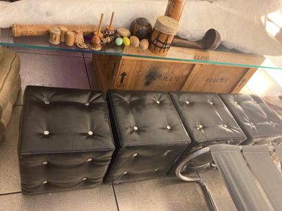 Suite of four black cubic poufs