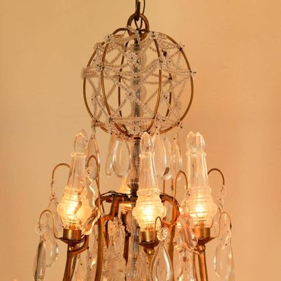 Important lustre à pampilles
Bronze et cristal
170...
