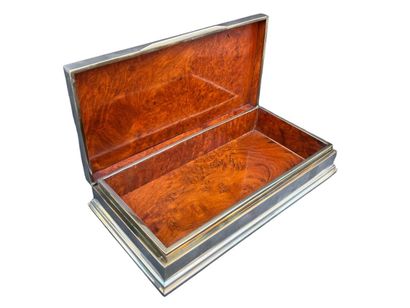 Silver box. Burr wood interior.
Foreign work....