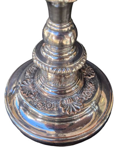 Pair of large silver-plated candlesticks.
H:...