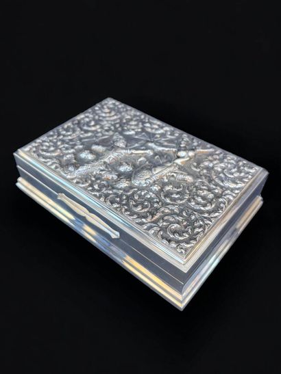 Silver box with repoussé decoration of dancers....