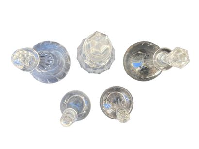 Set of five crystal decanters. 
H: 36 cm...