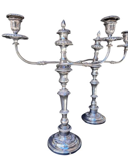 Pair of large silver-plated candlesticks.
H:...