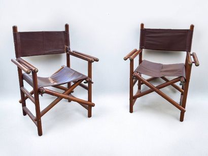 Paire de fauteuils pliables en bois et cuir....