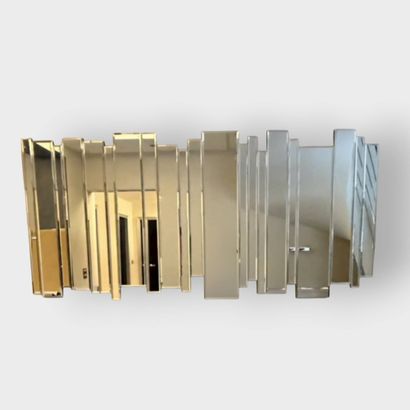 Large contemporary mirror composed of a succession...