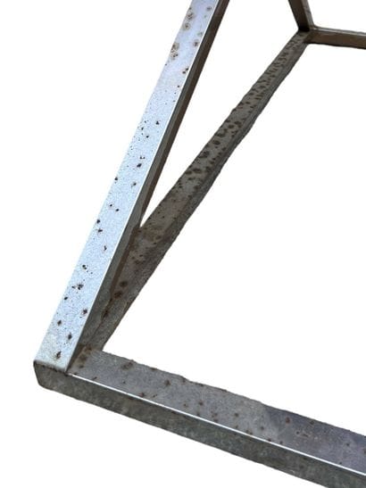 Chrome-plated metal console with glass top.
Circa...