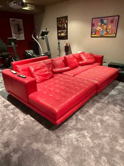 Large sofa upholstered in red leather.
With...