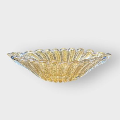 MURANO.
Shuttle-shaped, gadrooned glass bowl...