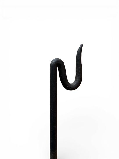 Free-form, patinated wrought-iron valet.
Three...