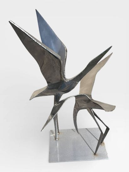 Stainless steel sculpture of a pair of birds...