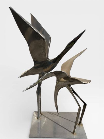 Stainless steel sculpture of a pair of birds...