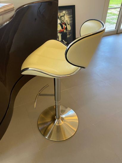 Set of 3 bar chairs resting on chrome-plated...