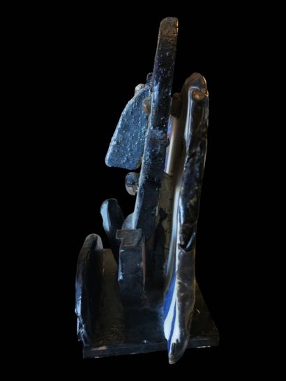 Glazed ceramic sculpture of a blue, black...