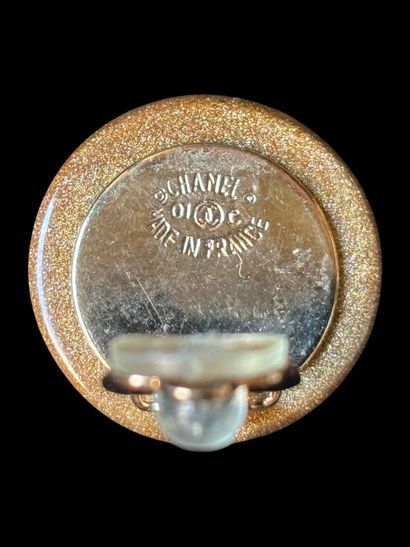CHANEL
Pair of clip earrings in resin with...