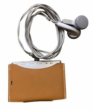 HERMÈS 
Portable radio in Swift Gold leather...