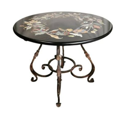 Pedestal table with iron and brass
brass...