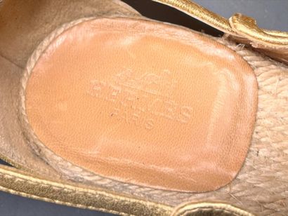 HERMÈS
Pair of wood, rope and gold leather...