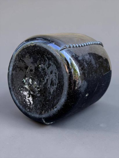 Brown blown glass bottle 
18th century
Height:...