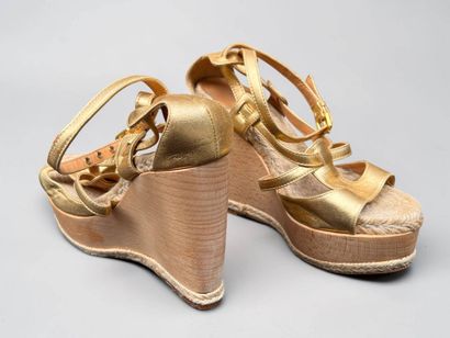 HERMÈS
Pair of wood, rope and gold leather...