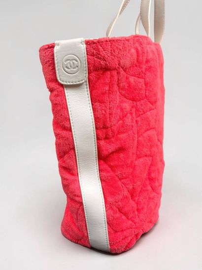 CHANEL
Beach tote bag in pink and white terry...