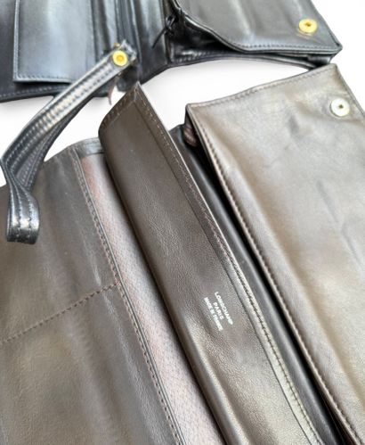 LONGCHAMP
Two handbags and a toiletry bag...