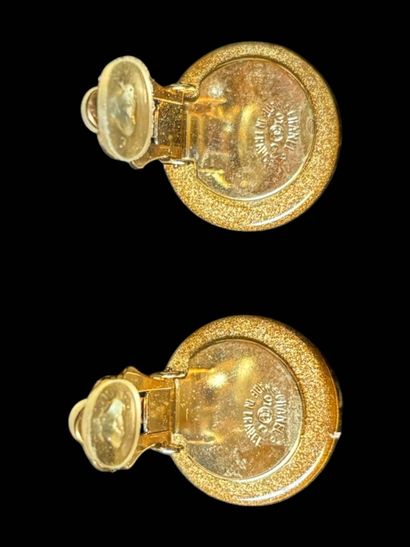 CHANEL
Pair of clip earrings in resin with...