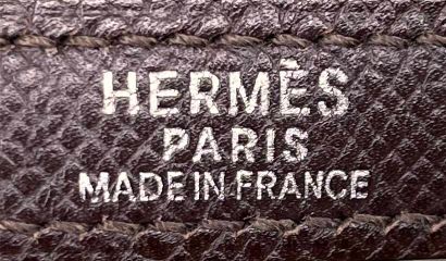 HERMÈS
Rigid Kelly model handbag in chocolate...