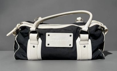 BURBERRY
Black fabric and white leather bag
L...