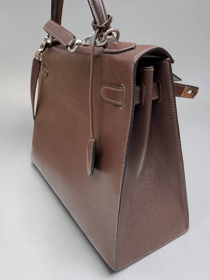 HERMÈS
Rigid Kelly model handbag in chocolate...