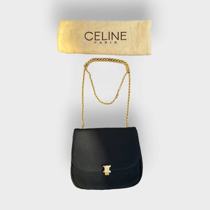 CELINE Paris
Evening handbag with flap.
Clasp...