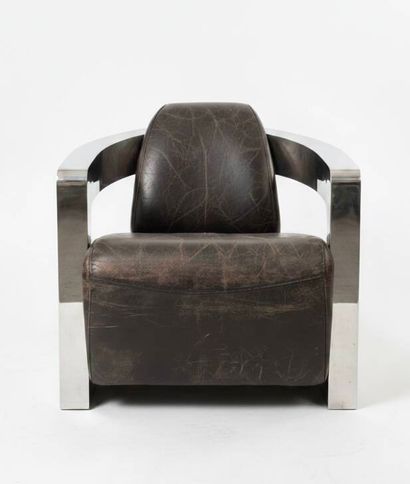 Contemporary work 
Armchair with polished...