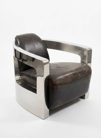 Contemporary work 
Armchair with polished...