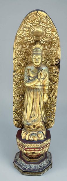 Asian divinity in carved and gilded wood
Height:...
