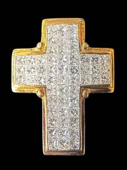 Cross pendant in 750°/°° (18 K) yellow gold...