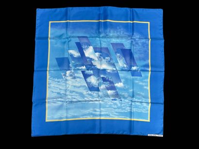 HERMÈS
Silk square with clouds printed for...