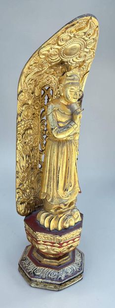 Asian divinity in carved and gilded wood
Height:...