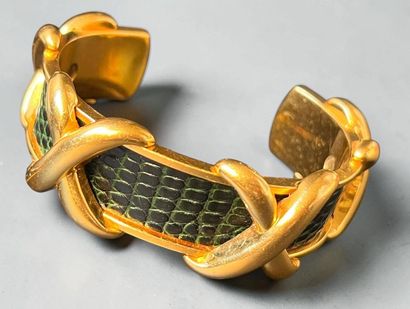HERMÈS
Rigid bangle in gold-plated metal...