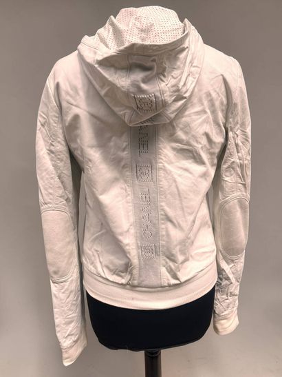 CHANEL
White leather jacket, monogram fabric...