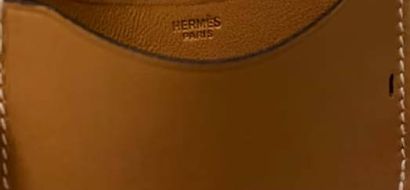 HERMÈS 
Portable radio in Swift Gold leather...